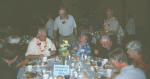 Ed Purdy (In lei), Pat Purdy (seated), ?? (standing), ?? (seated), Walt Seibecker (standing - rear), ??, ??